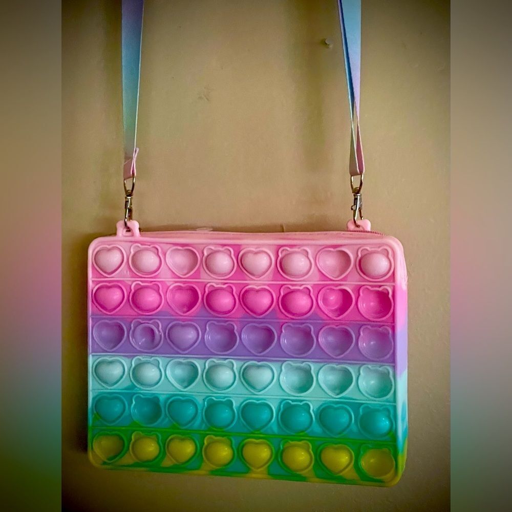 Unique “pop-it” Crossbody